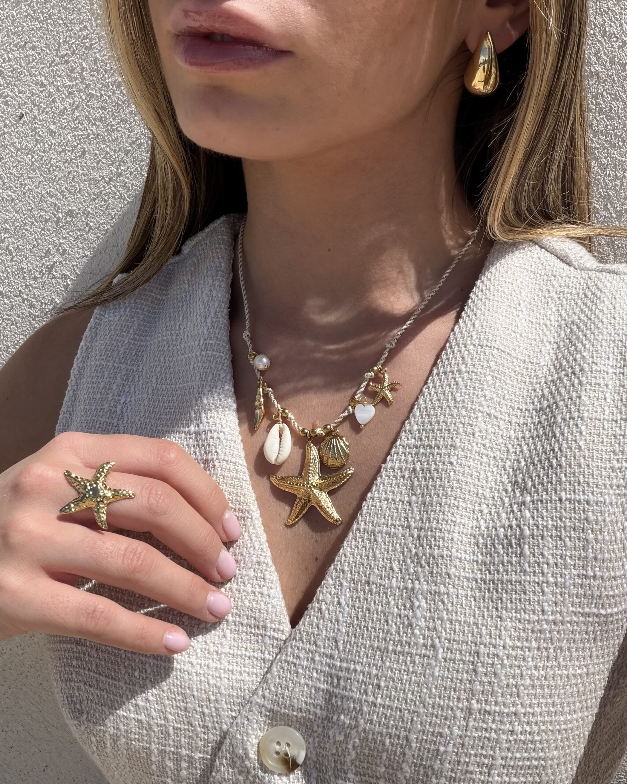 Collier à breloques maritimes (étoile de mer, coquillages)