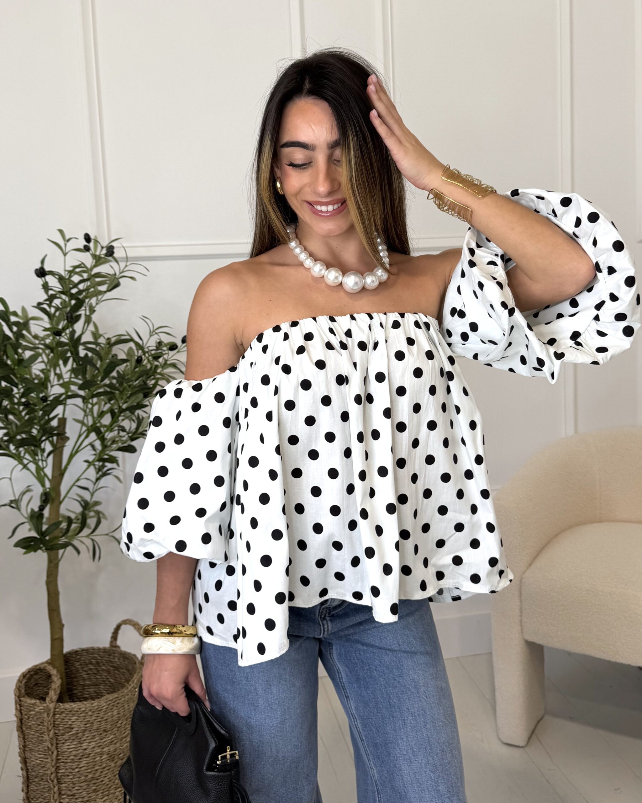Top sans manches bandeau à manches bouffantes blanc à pois